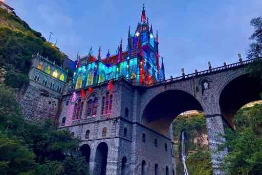 At night, the Las Lajas Sanctuary Colombia becomes a blazing multicolor light show.